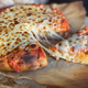Ultimate Stuffed Crust pizza on parchment paper